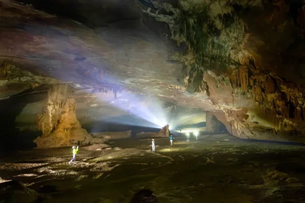 Victory Cave chamber with expedition lights — Hang Thắng, Phong Nha — photo: LuxTravel / Jungle Boss source