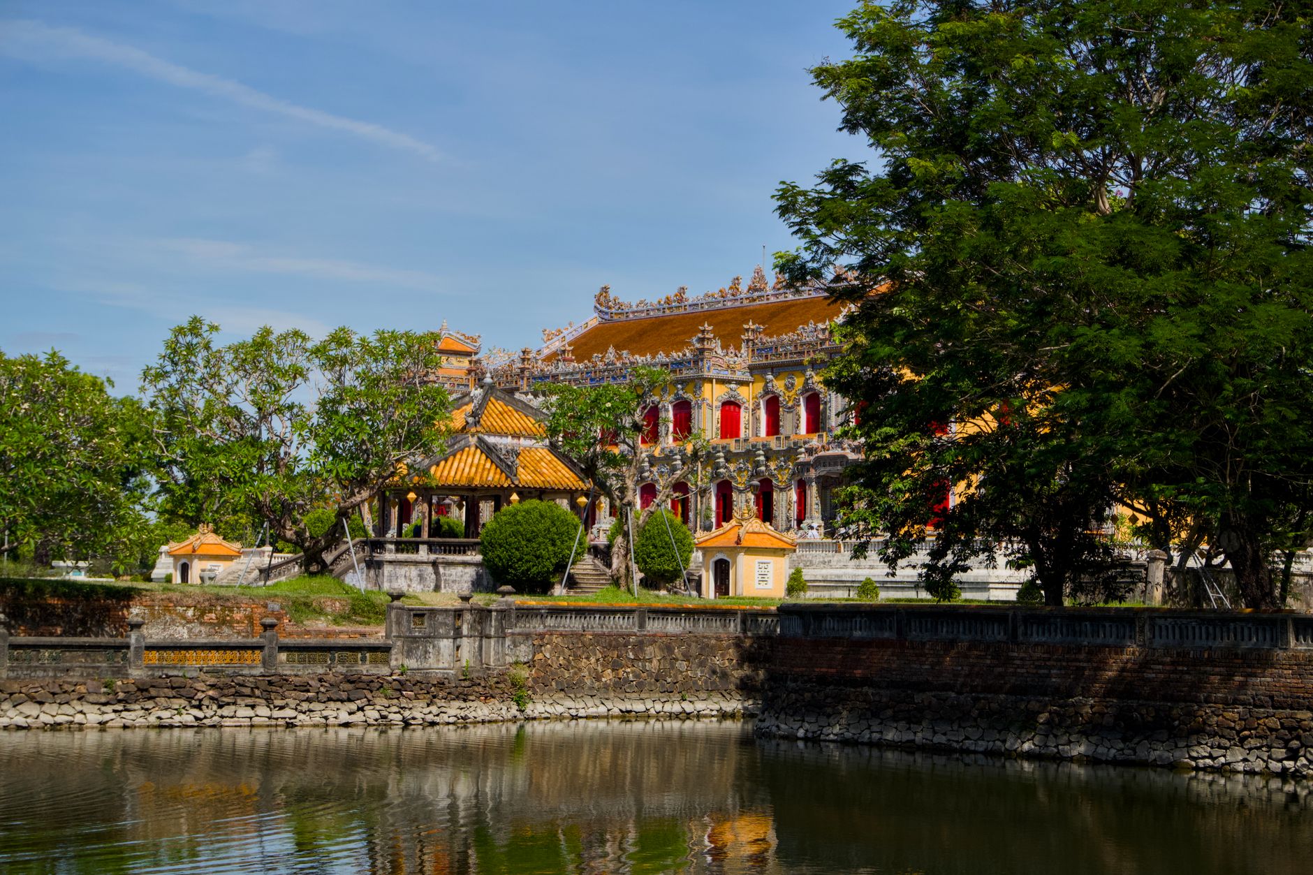 Further reading — A beautiful Vietnamese temple with intricate architecture reflected in a serene (photo: Tuan Vy)