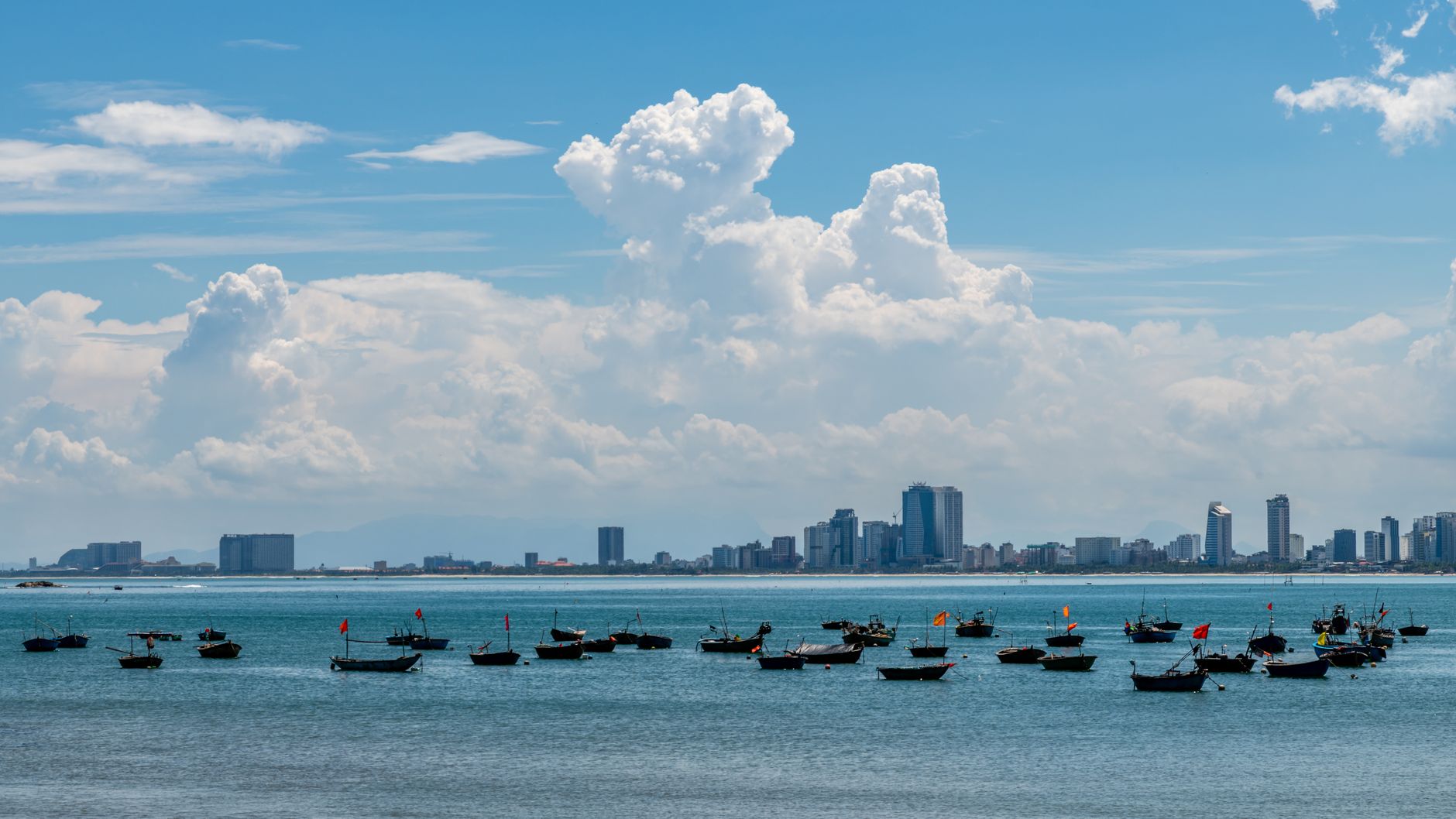 Planning Notes — Beautiful view of Da Nang cityscape with boats in the foreground on a sunny day. (photo: Kirandeep Singh Walia)