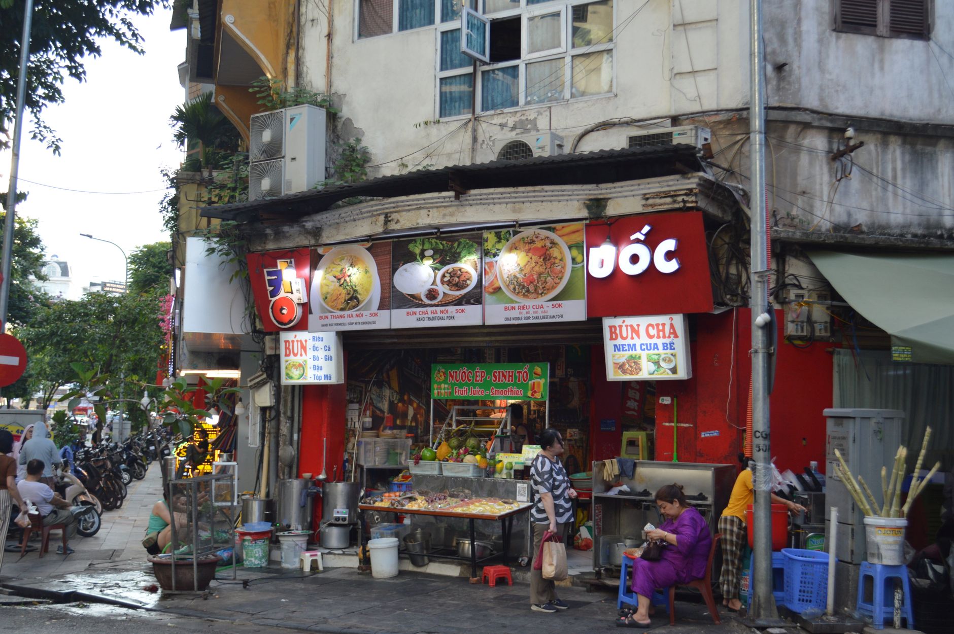 Authentic Vietnamese street food stall selling bun cha in Hanoi — photo: Valeria Drozdova