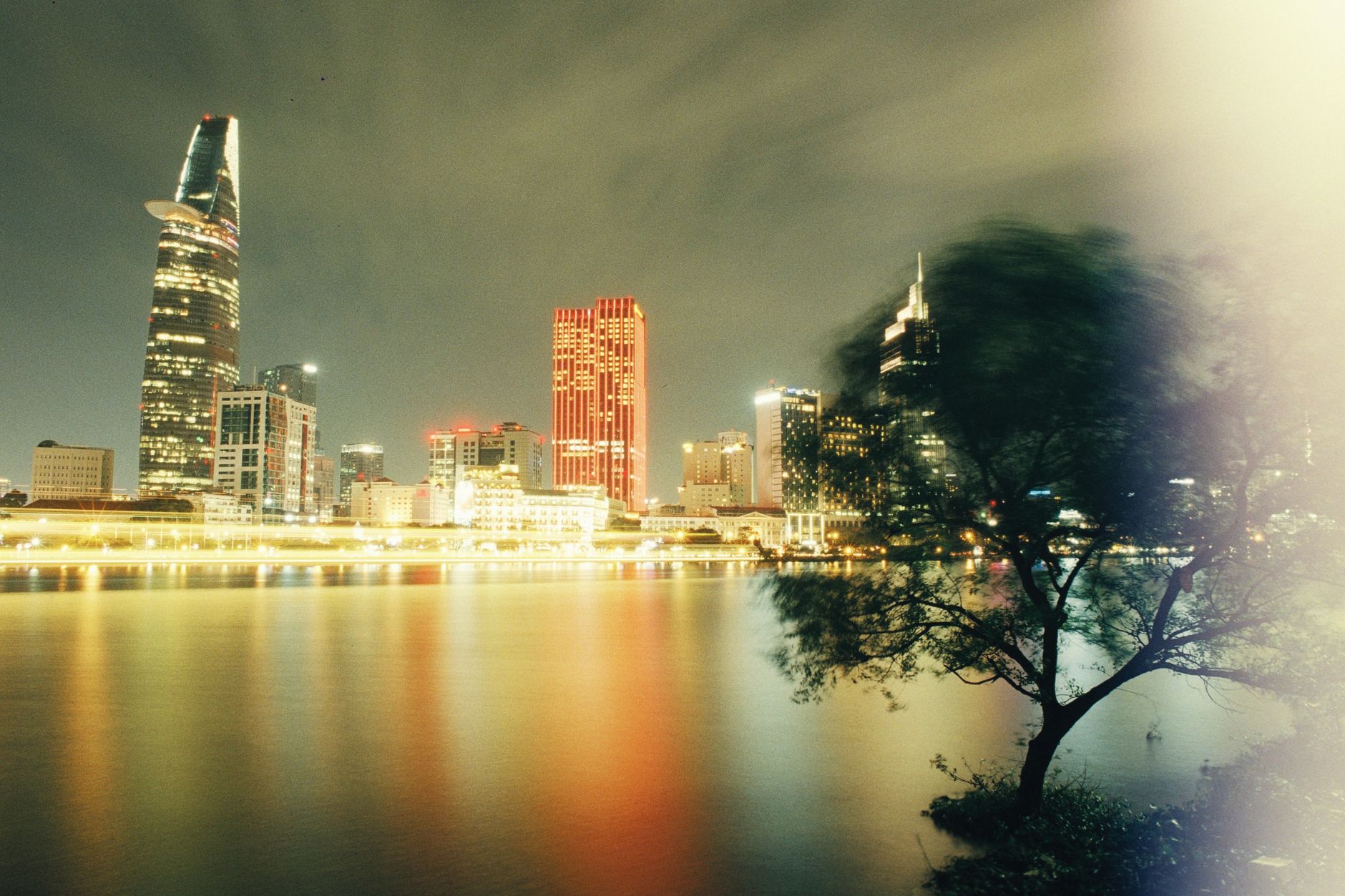 Nearby Ideas β Stunning Ho Chi Minh City skyline with illuminated skyscrapers reflecting in the (photo: Hom Nay Chup Gi)