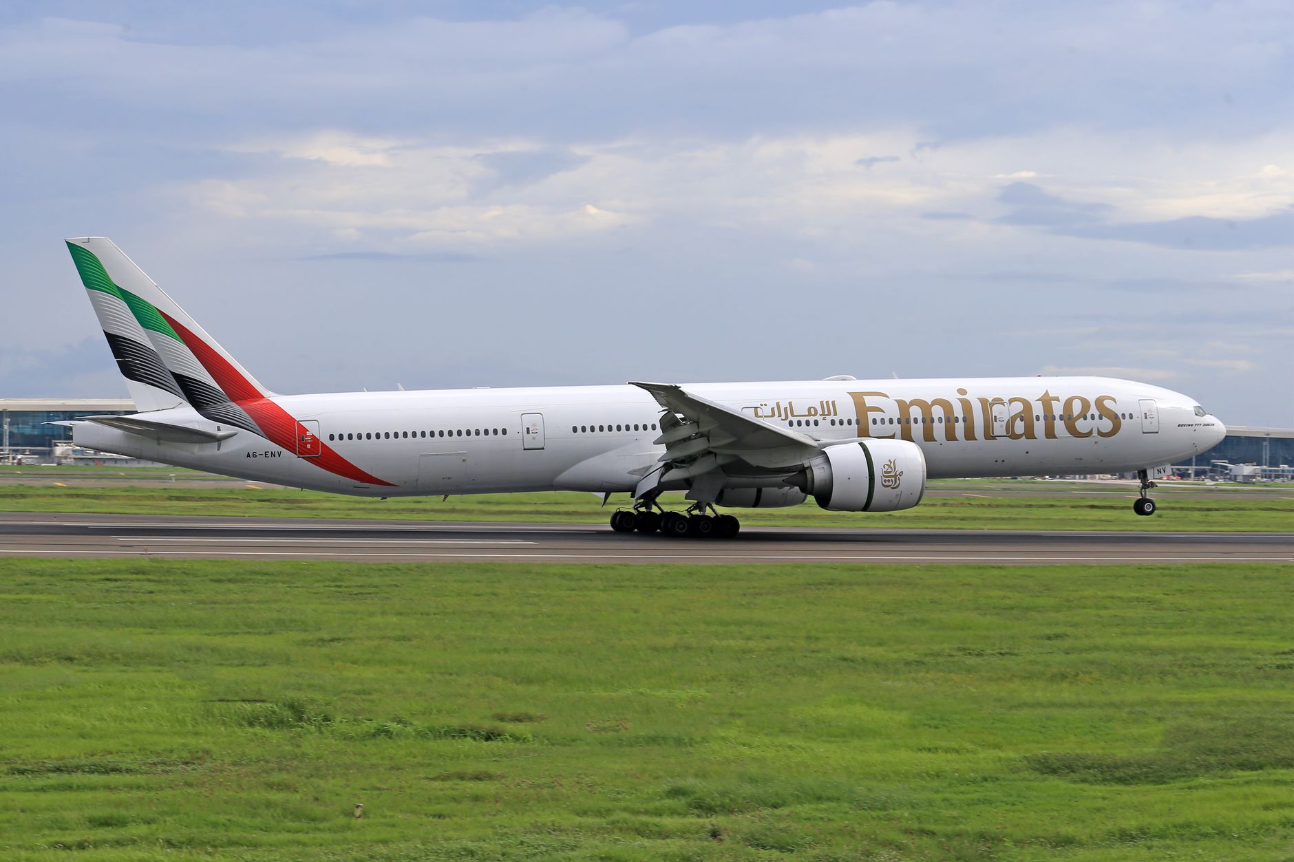 Hours Bird in Practice — Emirates jet captured during takeoff on a clear day at the airport runway. (photo: Jeffry Surianto)